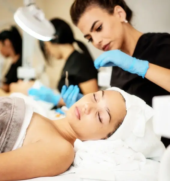 beauty and health institute woman undergoing a facial treatment in a beauty salon